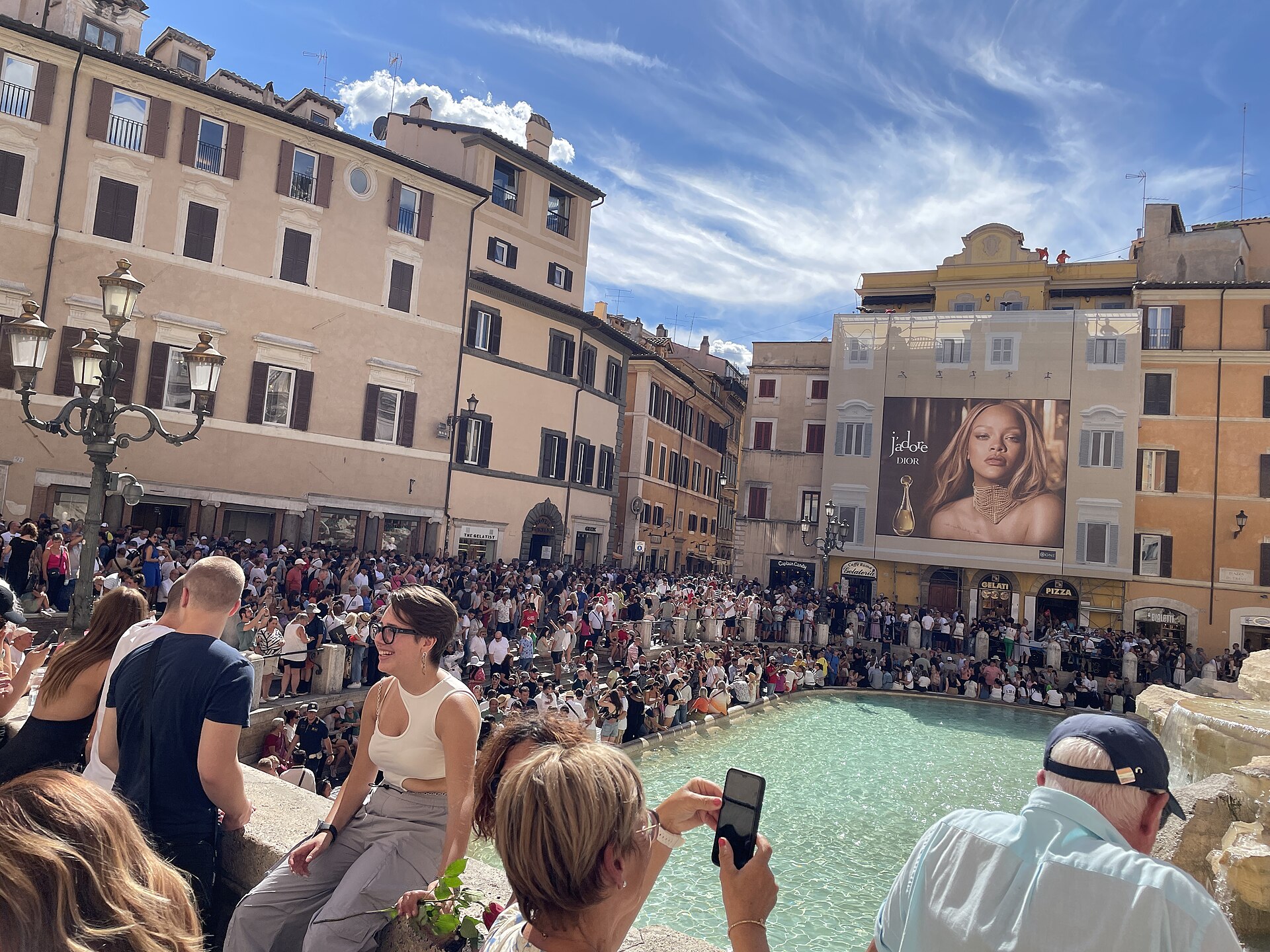 crowded tourist attraction queue